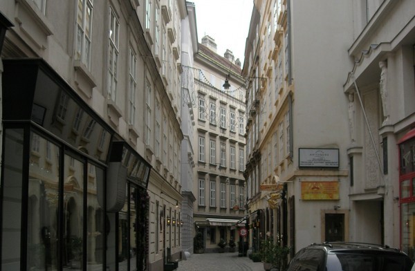 Mozart died in his apartment on Rauhenstein Lane. The house is gone. But stand with your back to the department store now there and you see just what he’d have seen: Ballgasse, named for the indoor tennis court which used to be on the corner.