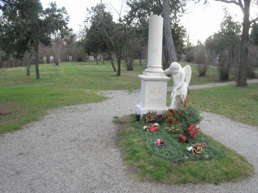 Mozart was buried in St. Marx Cemetery, a 10 minute tram-ride from the edge of old Vienna. This marker was put up in his honor, but no one knows where he lies -- somewhere under the grass behind the tombstone. The land was reused for later graves.